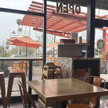Roll Em Up Taquitos - Interior view looking out towards the patio - Mexican Near Me - Pasadena, California