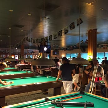 Clicks Billiards - people playing billiards in a pool hall - Pool Halls Near Me - Tucson, Arizona Clicks Billiards - people playing billiards in a pool hall - Pool Halls Near Me - Tucson, Arizona