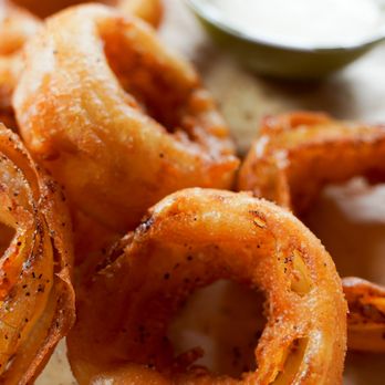 Lazlo's Brewery & Grill - Crispy Beer Battered Onion Rings -- big enough to make a meal out of them. Served best with sides of Creamy Garlic and Honey Mustard. - American Near Me - Lincoln, Nebraska Lazlo's Brewery & Grill - Crispy Beer Battered Onion Rings -- big enough to make a meal out of them. Served best with sides of Creamy Garlic and Honey Mustard. - American Near Me - Lincoln, Nebraska