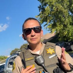 Santa Clarita Valley Sheriffs Station - she moved her hands in this sense and I can see her name, but I can't see her badge number