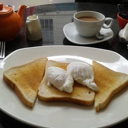 Damn Fine Cafe - Poached eggs on toast with tea.