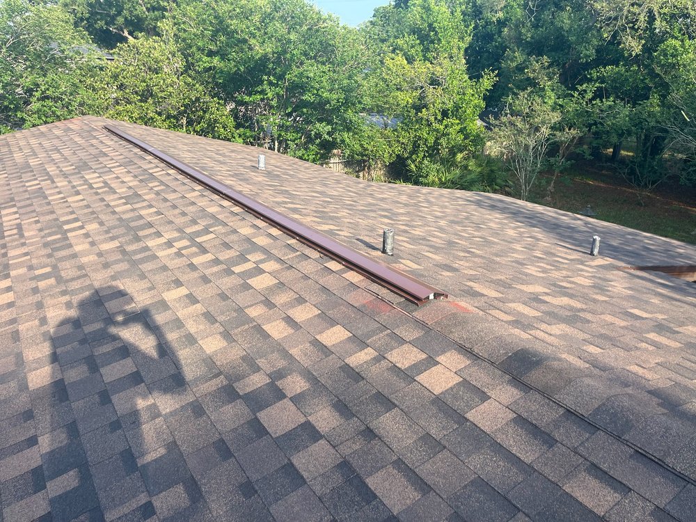 Slide of GRIT Roofing