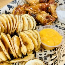 Slidsters Tap House - Honey Hot wings. Fried right, nice and crispy.