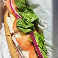 The Northshore sammie with added spinach between gluten-free bread- hits the spot!