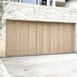 Exterior outside entrance of Ziegler Doors - Look at this natural finish on a rift sawn white oak garage door built for First Light Development in Manhattan Beach. - Santa Ana, California Exterior outside entrance of Ziegler Doors - Look at this natural finish on a rift sawn white oak garage door built for First Light Development in Manhattan Beach. - Santa Ana, California
