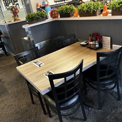 Mom's Deli & Grille - Dining area, clean lowtops