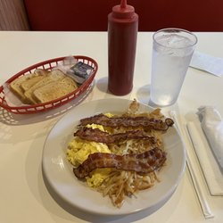 Carolina Family Restaurant - Breakfast Special   2 scrambled eggs bacon hash browns and toast