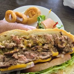 Double patty burger with onion rings. Rings were off the hook because the oil not being old. The Big Louie Double patty burger with onion rings. Rings were off the hook because the oil not being old. The Big Louie