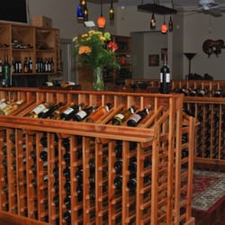 Southern Napa Fine Wine Store - Custom wine racks made from 100 year old reclaimed Cypress hardwood from torn down fish camps in the Louisiana delta