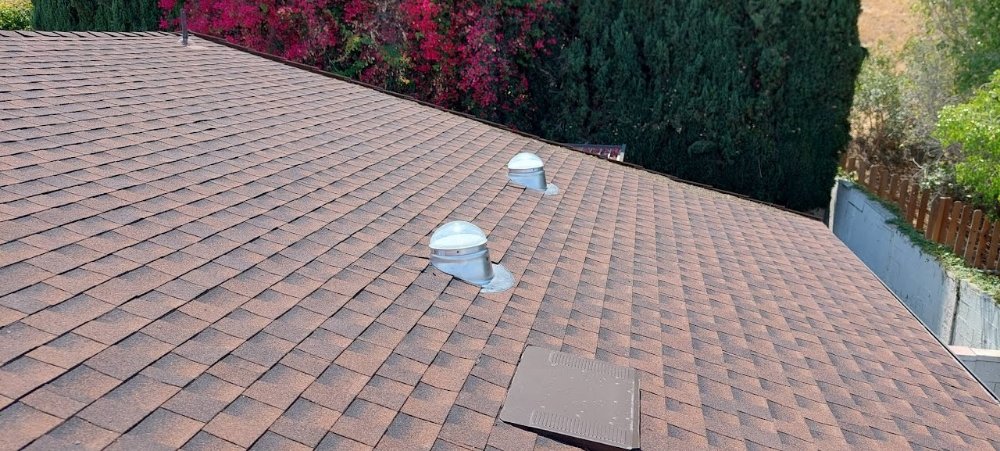 Slide of The Roofing Company