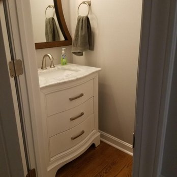 S D Kalinyak Contracting - a bathroom with a sink and mirror - General Contractors Near Me S D Kalinyak Contracting - a bathroom with a sink and mirror - General Contractors Near Me
