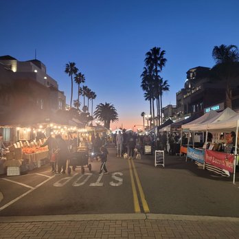 Surf City Nights - a busy street at dusk - Farmers Market Near Me - Huntington Beach, California Surf City Nights - a busy street at dusk - Farmers Market Near Me - Huntington Beach, California
