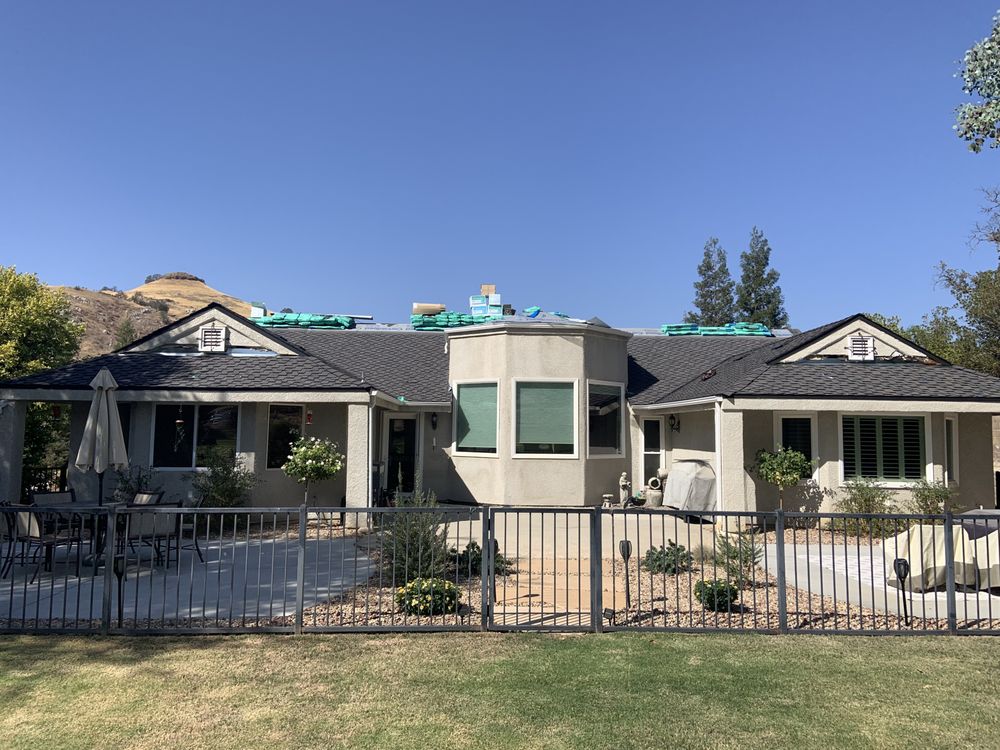 Slide of Revival Roofing