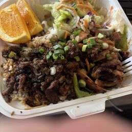 Steak and Chicken plate with half vegetable and half brown rice. Steak and Chicken plate with half vegetable and half brown rice.