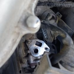 Ozark Auto Repair - Electronic Gas Recirculation valve mounting plate and Electronic plug