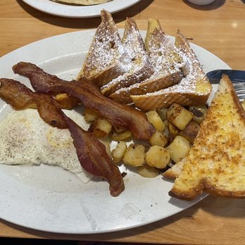 The Nest Diner - Texas French Toast is to die for! Lol I already cut into my eggs. - American Near Me - Cypress, Texas The Nest Diner - Texas French Toast is to die for! Lol I already cut into my eggs. - American Near Me - Cypress, Texas