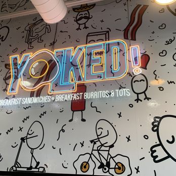 Yolked - a neon sign on the wall of a restaurant - Breakfast & Brunch Near Me - Bakersfield, California Yolked - a neon sign on the wall of a restaurant - Breakfast & Brunch Near Me - Bakersfield, California