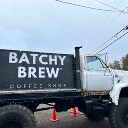 a truck with a sign on the back