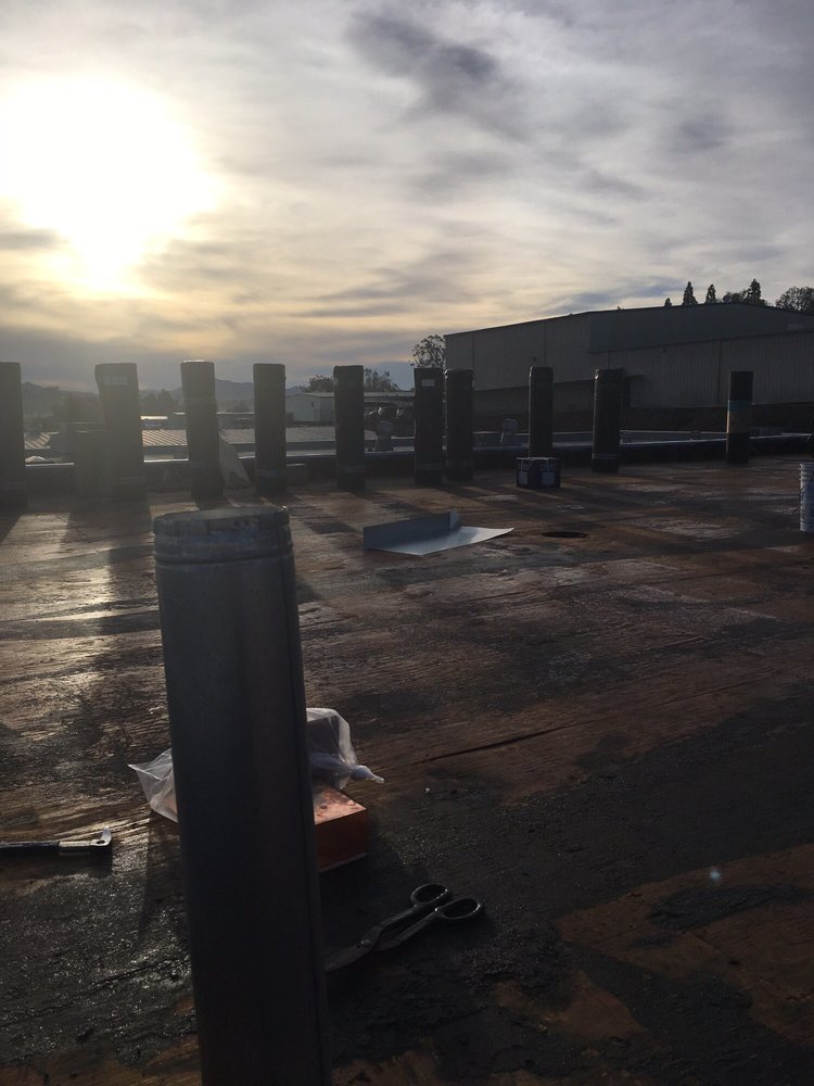 Slide of Vulcan Roofing Co