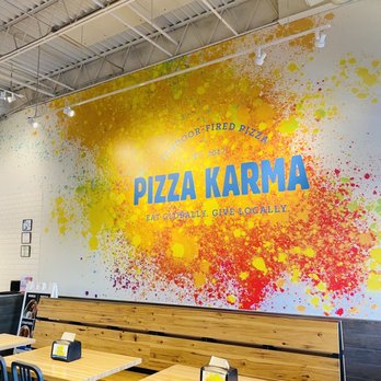 PIZZA KARMA | Food Truck Catering - Eden Prairie - a restaurant with tables and chairs - Pizza Near Me - Eden Prairie, Minnesota PIZZA KARMA | Food Truck Catering - Eden Prairie - a restaurant with tables and chairs - Pizza Near Me - Eden Prairie, Minnesota