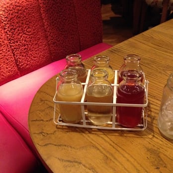 The Village - Kids can mix their own cocktails at the table, with this retro milk bottle kit of juices, fizzies and cordials. - Bars Near Me - Birmingham, XWM