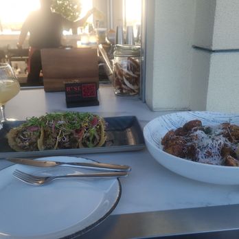 Rise Rooftop Lounge - Duck Tacos and potatoes - Lounges Near Me - Anaheim, California Rise Rooftop Lounge - Duck Tacos and potatoes - Lounges Near Me - Anaheim, California