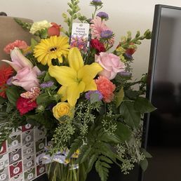 The bouquet that was received. Overwhelmed with greens and few flowers. The bouquet that was received. Overwhelmed with greens and few flowers.