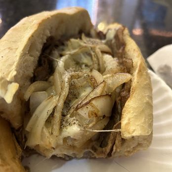 Pinocchios Pizza & Subs - The key is grilled onions, slices of steak not chopped steak - Pizza Near Me - Cambridge, Massachusetts
