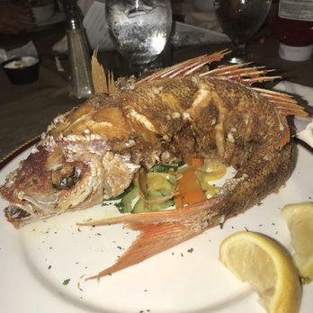 Villa Cofresi - Snapper taste way better than it looks, he looks pissed of that he was deep fried but it was Bomb. - Hotels Near Me - Rincon, Puerto Rico Villa Cofresi - Snapper taste way better than it looks, he looks pissed of that he was deep fried but it was Bomb. - Hotels Near Me - Rincon, Puerto Rico