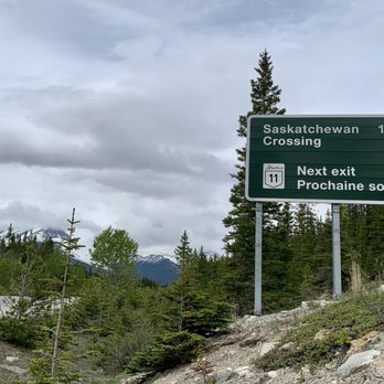 The Crossing Resort - The road sign for Saskatchewan River Crossing. - Hotels Near Me - Lake Louise, Alberta