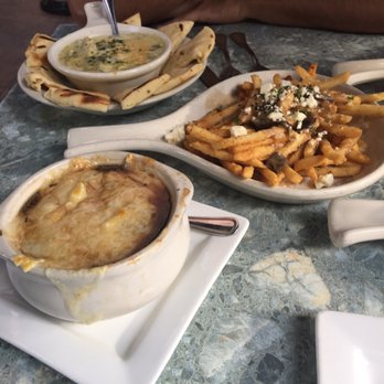 Wild River Grille - Happy hour! French onion soup (4.5), Poutine (6.5), Artichoke dip...so good! - New American Near Me - Reno, Nevada