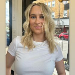 Styles by Lydia Beauty Bar - Heavy grave face framing highlights with a heavy Blonde balayage.