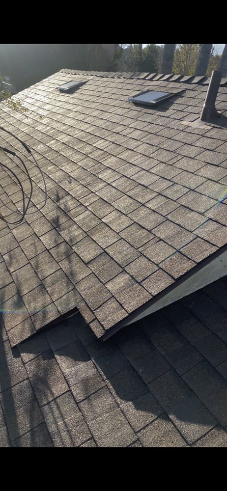 Slide of A&M Roofing and Gutters