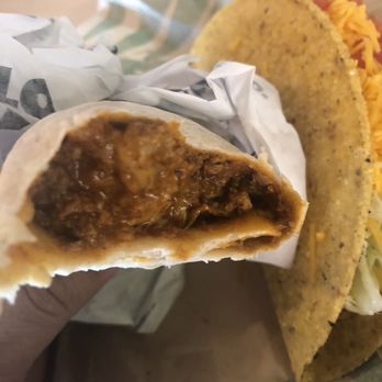 Del Taco - Sorry for the bite photo, but you have to see the inside! Stuffed with cheese, sauce, and Beyond Meat! - Fast Food Near Me - Sacramento, California