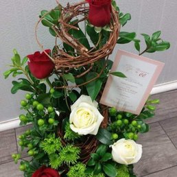 The flowers she created for me for a friends wedding anniversary 8/22/2016.. Simple, modern and beautiful.