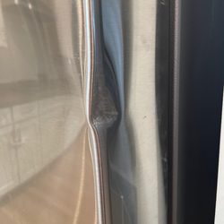 Two Men and a Truck Plainfield - Fridge dent