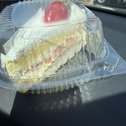 Tres Leche  topped with a strawberry