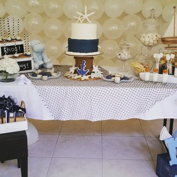 Ellie Bee Bakery - a table set up for a nautical themed baby shower - Custom Cakes Near Me Ellie Bee Bakery - a table set up for a nautical themed baby shower - Custom Cakes Near Me