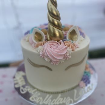 One Stop Bakery - a birthday cake with a unicorn horn on top - Bakeries Near Me - Lancaster, California