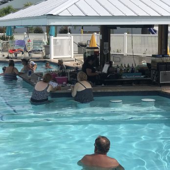 Sun Outdoors Rehoboth Bay - Swim up bar - Campgrounds Near Me - Millsboro, Delaware Sun Outdoors Rehoboth Bay - Swim up bar - Campgrounds Near Me - Millsboro, Delaware