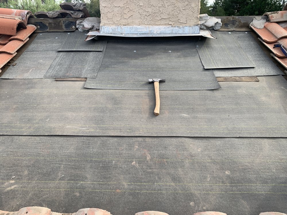 Slide of El Puma Roofing