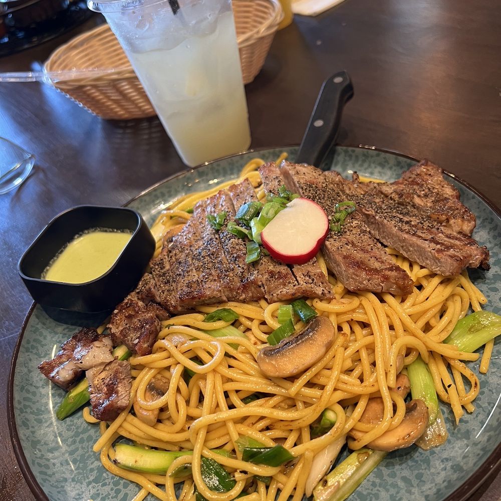 OMELI Kitchen - Ribeye with Rib Eye Garlic Noodles and . Guanabana fruit tea. - Vietnamese Near Me - Fullerton, California OMELI Kitchen - Ribeye with Rib Eye Garlic Noodles and . Guanabana fruit tea. - Vietnamese Near Me - Fullerton, California
