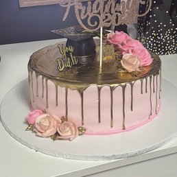 My daughters amazing graduation cake!!! Yellow cake, strawberry filling, buttercream icing
