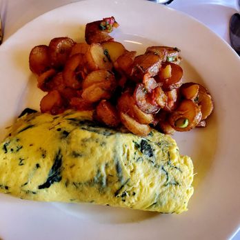 The Odeon - Three Egg Omelet with a choice of 4 fillings - New American Near Me - New York, New York The Odeon - Three Egg Omelet with a choice of 4 fillings - New American Near Me - New York, New York