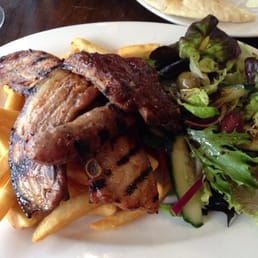 One of the specials. Mixed pork grill. Two different styles of pork ribs and a pork sausage. One of the specials. Mixed pork grill. Two different styles of pork ribs and a pork sausage.