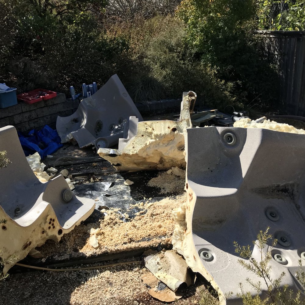 The old hot tub in pieces. The old hot tub in pieces.