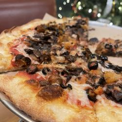 Marley G’s pizzeria - 12" pizza w/ non-dairy cheese, olives, mushrooms and crispy eggplant.