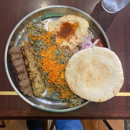 Combo w/chicken Kifta, beef Kifta, Persian rice, hummus, cucumber, tomato, red onion salad & hot pita bread Combo w/chicken Kifta, beef Kifta, Persian rice, hummus, cucumber, tomato, red onion salad & hot pita bread