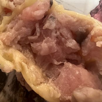 Dim Sum Palace - Uncooked pork in an order of Shu. Mai............... - Dim Sum Near Me - New York, New York Dim Sum Palace - Uncooked pork in an order of Shu. Mai............... - Dim Sum Near Me - New York, New York