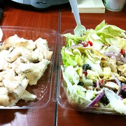 two containers of food on a table